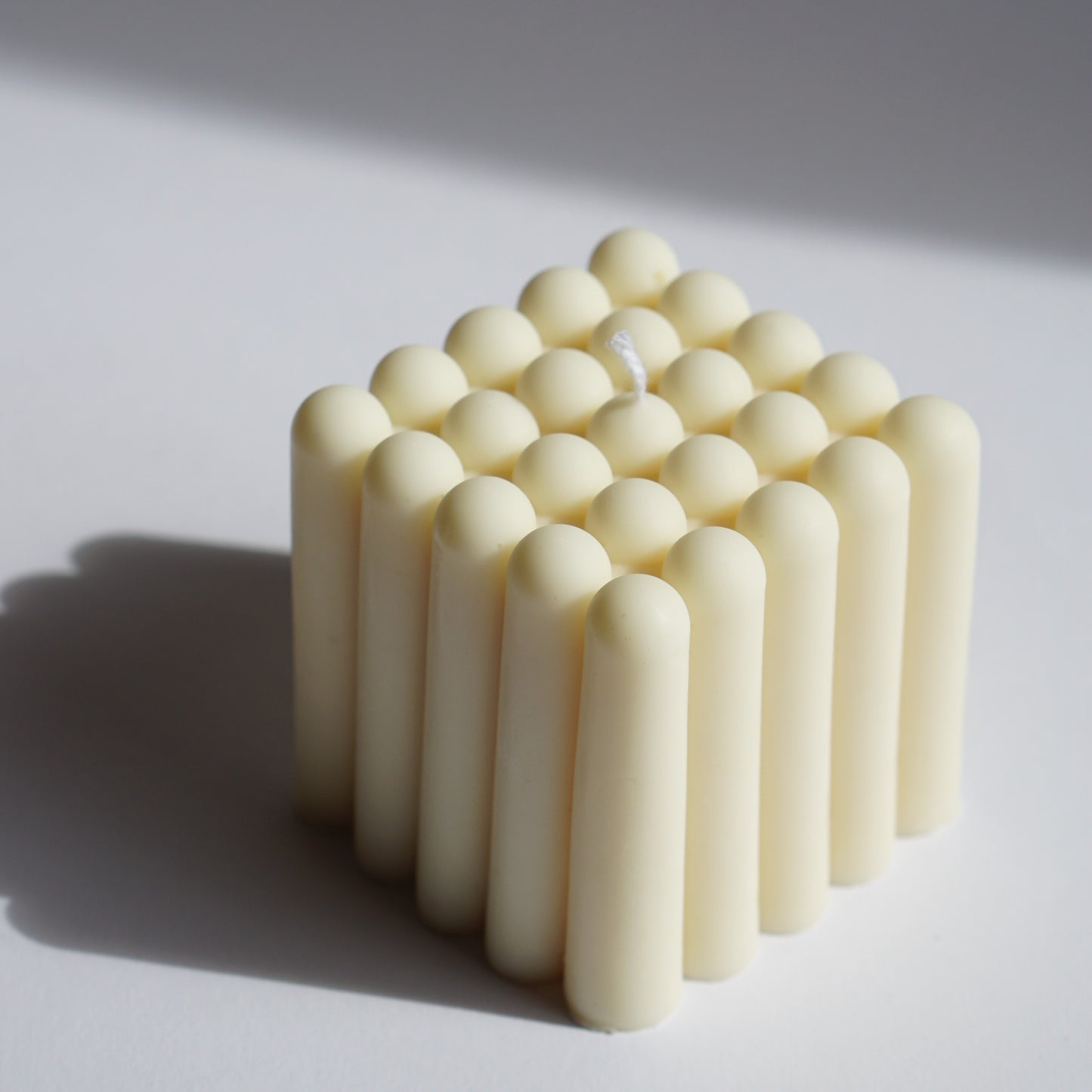 Quadratische Formkerze